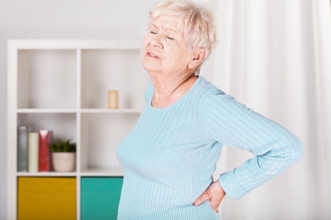 bir kadında bel ağrısı osteokondrozun nedeni olabilir